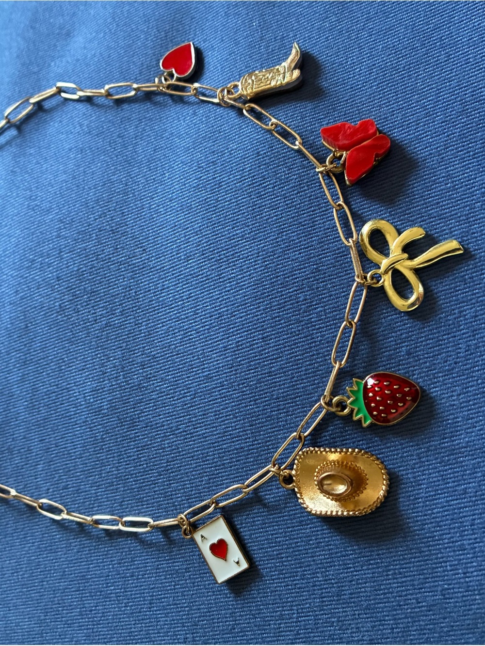 Gold Charm Necklace with Red Enamel Accents